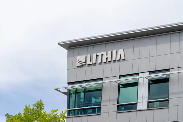 stock image Lithia headquarters in Medford, Oregon, USA - June 13, 2023. Lithia Motors is an American vehicle automotive dealership group.