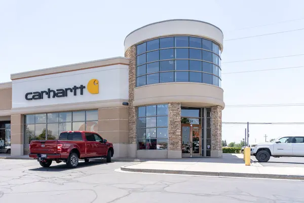 stock image Carhartt work clothes store in Murray, Utah, USA, on June 23, 2023. Carhartt is a retailer of rugged, workwear-inspired apparel, shoes and accessories.