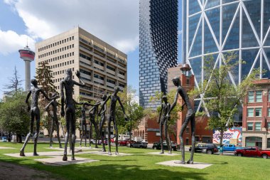 Family of Man, sculptures in downtown Calgary, Alberta, Canada, on July 3, 2023. Installed in 1968, the sculptures by the Spanish artist Mario became a landmark in Calgary clipart