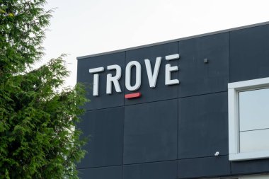 Trove Club in Richmond, BC, Canada, July 7, 2023. Trove Club is an automotive and luxury lifestyle commercial development blended with industrial showroom and warehousing spaces. clipart