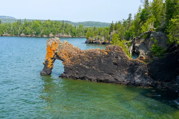 stock image Sea Lion rock is found in Sleeping Giant Provincial Park near Thunder Bay, Ontario, Canada. The Sea Lion is a sedimentary rock formation that projects 49 feet (15m) into Lake Superior