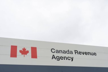 Ottawa, Ontario, Canada - October 16, 2023: Part of Canada Revenue Agency sign is seen in Ottawa. Canada Revenue Agency is the revenue service of the Government of Canada. clipart