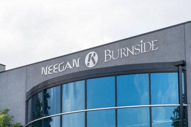 Winnipeg, MB, Canada - July 19, 2023: Neegan Burnside Ltd. office on Commerce Dr, in Winnipeg, Manitoba, Canada. Neegan Burnside is an Engineering consultant company.  clipart