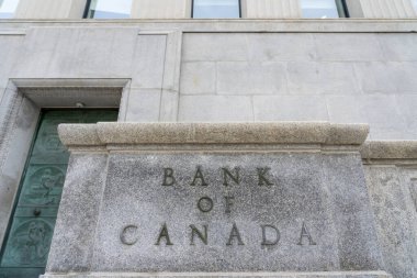 Kanada Bankası, Wellington caddesi, Ottawa, Kanada 'daki merkez ofis kompleksinin binasına 15 Ekim 2023' te imza attı. Kanada Bankası bir Crown şirketi ve Kanada merkez bankasıdır.