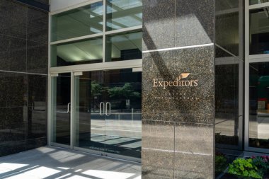 Expeditors Global Headquarters in Seattle, Washington, USA - June 15, 2023. Expeditors is an American worldwide logistics and freight forwarding company. clipart