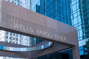 Houston, Texas, USA - April 4, 2024: Wells Fargo Plaza in Houston, Texas, USA. The Wells Fargo Plaza is a high-rise skyscraper. clipart