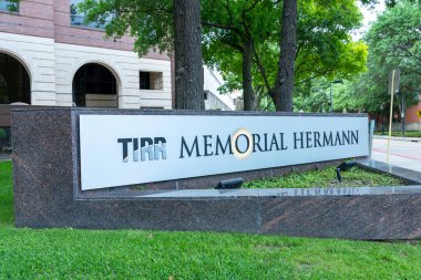 Pearland, Texas, USA - April 15, 2024: TIRR Memorial Hermann Hospital sign is seen at Texas Medical Center in Houston, Texas, USA. clipart