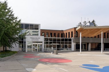 Oshawa, Ontario, Canada - September 26, 2020: Oshawa City Hall is shown in Oshawa, Ontario, Canada on September 26, 2020. clipart