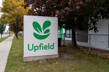 Etobicoke, ON, Canada - October 11, 2020: Upfield Canada Inc sign is seen in Etobicoke, ON, Canada. Upfield is a global company owning multiple brands of margarine and other food spreads. clipart