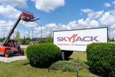 Guelph, Ontario, Canada - June 28, 2020: Skyjack headquarters in Guelph, Canada. Skyjack is a Canadian Manufacturer of self-propelled scissor lift platform, one of Linamar's industrial segment. clipart