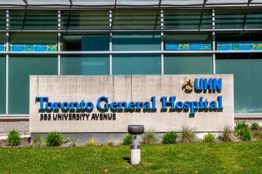 Toronto, Canada - May 16, 2020: Toronto General Hospital TGH signage in Toronto; TGH is a major teaching hospital in Toronto downtown and a part of the University Health Network UHN. clipart