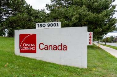 Scarborough, Toronto, Canada - August 29, 2020: Owens Corning Toronto sign is seen in Scarborough on August 29, 2020, an American company that produces insulation, roofing, and fiberglass clipart