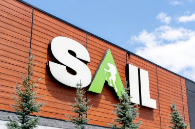 Oshawa, Ontario, Canada - July 1, 2020: SAIL store sign in Oshawa, Ontario, Canada. SAIL Outdoors Inc. is a Canadian outdoor equipment retailer with stores in Quebec and Ontario. clipart