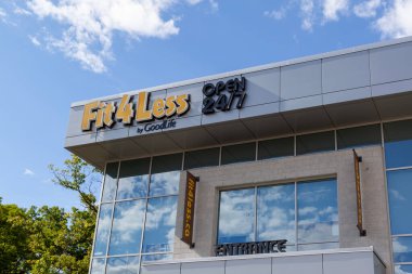 London, Ontario, Canada - August 30, 2020: Fit4Less sign on the wall. Fit4less is a Canada's Discount Fitness Gym by Goodlife. clipart