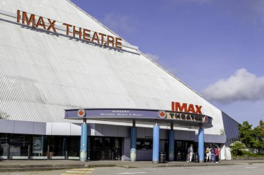 Niagara Falls, Ontario, Canada - September 3, 2019: Group people at IMAX Theatre in Niagara Falls, Ontario, Canada, a 60 feet tall and 80 feet wide movie screen.