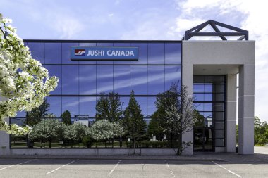 Markham, Ontario, Kanada - 21 Mayıs 2018: Markham, Ontario, Kanada 'daki Jushi Kanada binasını imzalayın. Merkezi Çin 'de bulunan Jushi Grubu dünyanın en büyük fiberglas takviyesi üreticilerinden biridir..