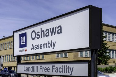 Oshawa, Ontario, Canada - July 1, 2019: Sign of GM Canada Oshawa Assembly in Oshawa, Ontario, Canada. clipart