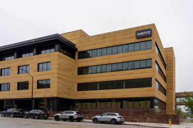 Des Moines, Iowa, USA - May 6, 2023: Weitz Company Corporate Headquarters in Des Moines, Iowa. The Weitz Company provides general contracting, construction management, and design build services. clipart