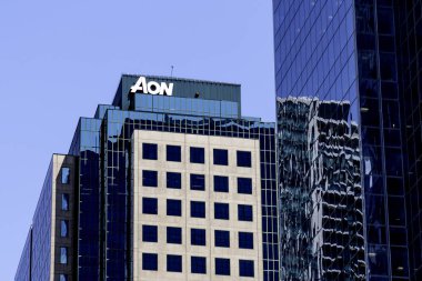 Toronto, Canada - July 31, 2019: Aon sign on the building in Toronto, Canada. Aon is a global professional services firm. In Canada, Aon operates under the name Aon Reed Stenhouse Inc. clipart