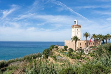 Cap Spartel Lighthouse near Tanger city, Morocco. Cape Spartel is the oldest lighthouse in Morocco and is the point where the Atlantic sea meets the Strait of Gibraltar. clipart