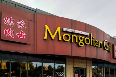 Toronto, Ontario, Canada - September 8, 2018: Sign of Genghis Khan Mongolian Grill Chinese restaurant at Don mills Rd North of Eglinton in Toronto, Canada. clipart