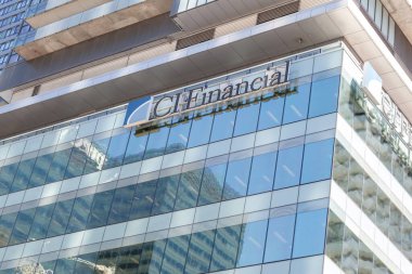 Toronto, Canada - June 19, 2018: CI Financial sign on the building in downtown Toronto. CI Financial is the second-largest nonbank affiliated investment management firm in Canada. clipart