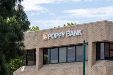 Poppy Bank office in Pleasanton, Ca, USA - June 12, 2023. Poppy Bank is a financial institution. clipart