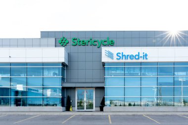 Oakville, Ontario, Canada - May 27, 2019: Shred-it Support Centre in Oakville, Ontario, Canada. Shred-it offers an integrated suite of services designed to protect your private information. clipart