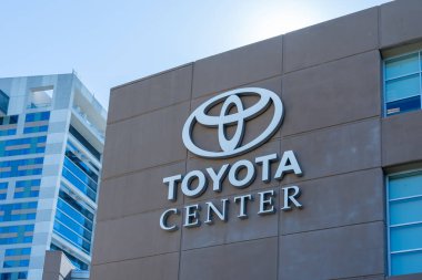 Houston, Texas, USA - April 4, 2024: Closeup of Toyota Center sign on the building in Houston, Texas, USA. Toyota Center is an indoor arena located in Houston. clipart