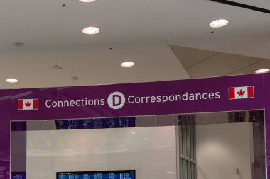 Mississauga, Ontario, Canada - September 13, 2024: Gate D Connections sign in Toronto Pearson International airport. Pearson Airport is the largest and busiest airport in Canada. clipart