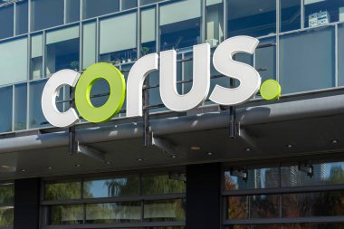 Toronto, Canada - October 29, 2019: Sign of the Corus Entertainment on the headquarter office building at Corus Quay in Toronto. Corus is a Canadian media and broadcasting company. clipart