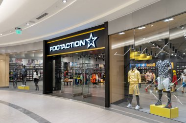 East Rutherford, NJ, USA - August 16, 2022: A Footaction shoe store at a shopping mall in East Rutherford, NJ, USA. clipart