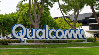 Close up of Qualcomm ground sign at their Silicon Valley office in Santa Clara, USA - June 10, 2023 clipart