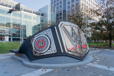 A sculpture of a championship belt in front of the offices of WWE on Washington Boulevard in Stamford, Connecticut, on November 7, 2023. WWE is an American professional wrestling promotion. clipart