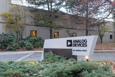 Analog Devices office building at 831 Woburn St in Wilmington, Massachusetts, USA, on November 10, 2023. Analog Devices is an American multinational semiconductor company. clipart