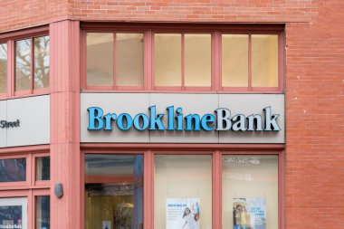 Boston, MA, USA - November 9, 2023: A Brookline Bank sign on the building in Boston, MA, USA. clipart