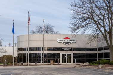 Briggs and Stratton company headquarters in Wauwatosa, WI, USA - May 3, 2023. Briggs and Stratton Corporation is an American manufacturer of gasoline engines. clipart