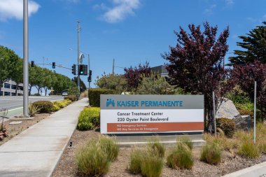 South San Francisco, CA, USA - June 7, 2023: The ground sign of Kaiser Permanente South San Francisco Cancer Treatment Center is seen at 220 Oyster Point Blvd in South San Francisco, CA, USA. clipart