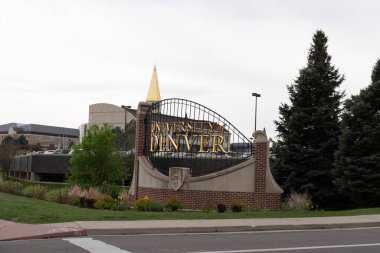 University of Denver ground sign is seen in Denver, Colorado, USA, May 18, 2023. Founded in 1864, the University of Denver is a private research university. clipart