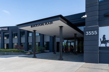 Omaha, NE, USA - May 6, 2023: Blackstone Plaza entrance in Omaha, NE, USA. Blackstone Plaza (formerly named as Kiewit Plaza) is a high-rise office building located at 3555 Farnam Street in Omaha clipart