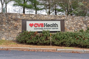 The sign of CVS Health Customer Support Center at its Corporate Headquarters at 1 CVS Dr, Woonsocket, RI, USA, November 10, 2023. CVS Health Corporation is an American healthcare company. clipart