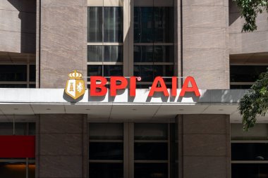 Makati City, Filipinler - 1 Şubat 2025: BPI AIA logosu ve Filipinler 'deki Makati City ofis binasına imza.