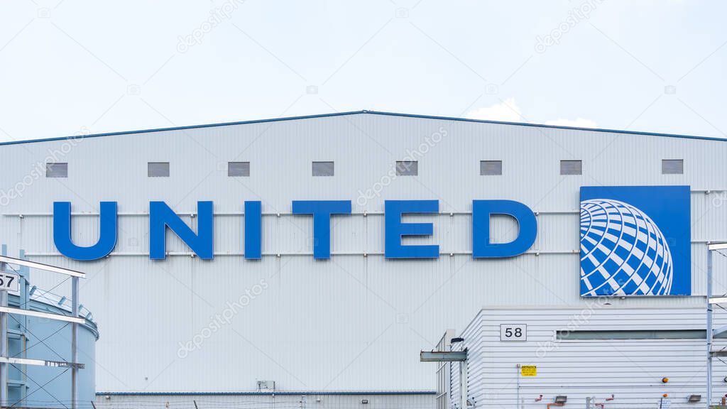 Newark, NJ, USA - August 23, 2022: United Airlines sign on the building in Newark, NJ, USA. United Airlines is an aviation provider in the United States.