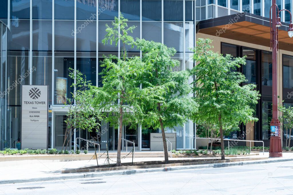 Houston, Texas, USA - April 14, 2024: A directory sign at Texas Tower with company name Hines, ChENIERE, DLA PIPER and Trafigura at 845 Texas Ave in Houston, Texas, USA.