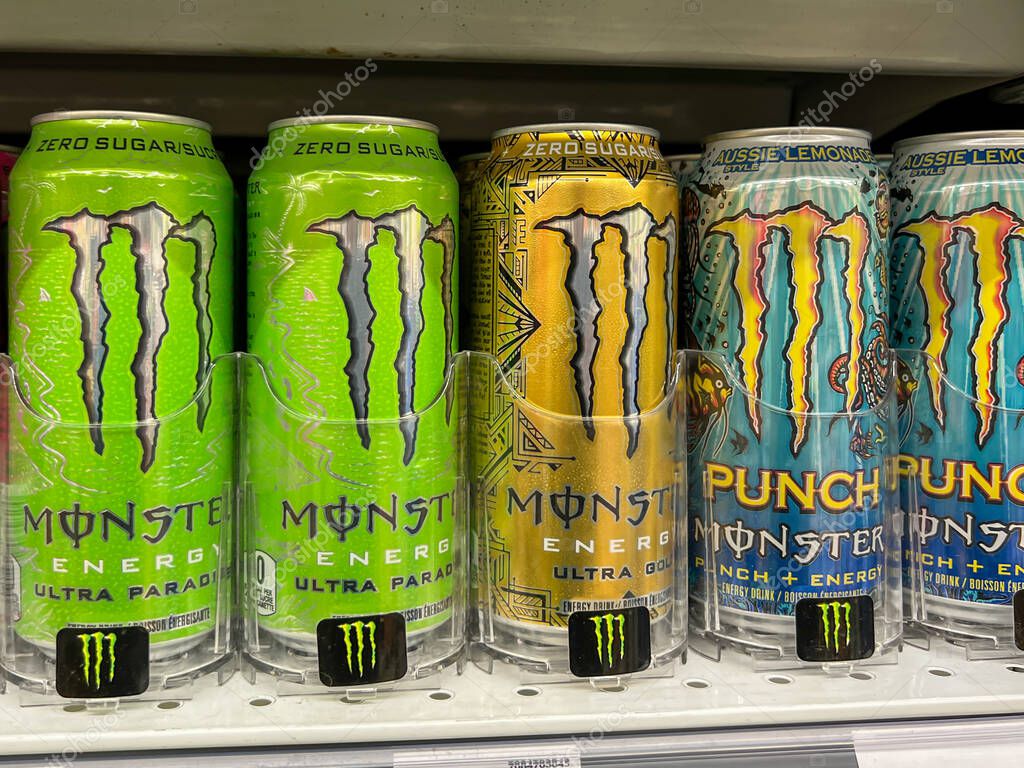 Calgary, Alberta, Canada - July 18, 2023: Variety of Monster Energy Drink cans for sale on the shelves in a supermarket. Calgary, Alberta, Canada.