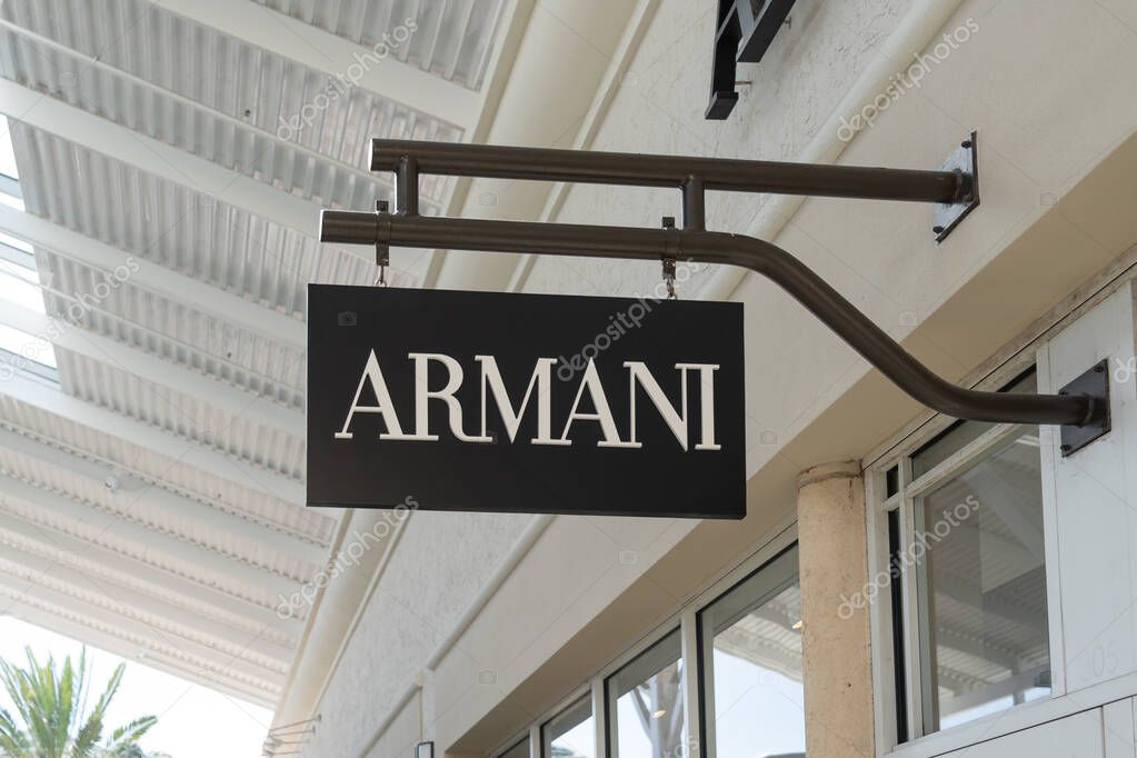 Orlando, Florida, USA - January 20, 2022: Armani hanging sign at a shopping mall in Orlando, FL, USA. Giorgio Armani S.p.A., commonly known as Armani, is an Italian luxury fashion house.