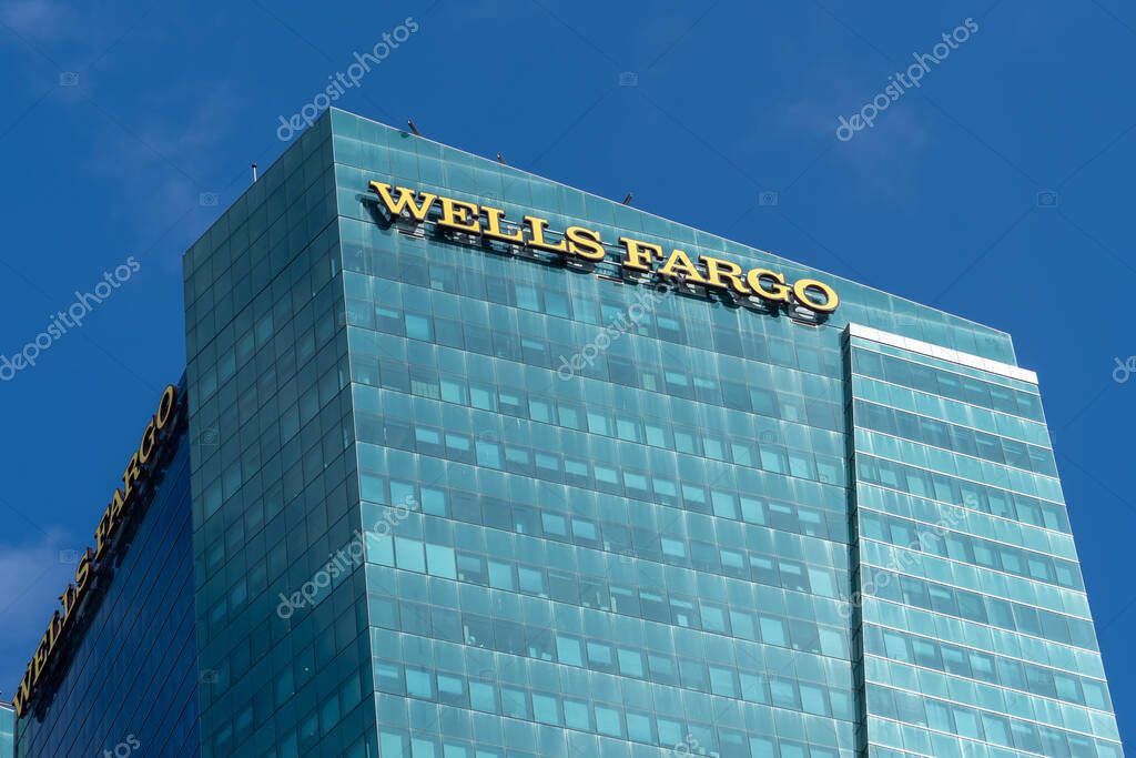 Miami, FL, USA - January 2, 2022: Wells Fargo sign on the Wells Fargo Center building in Miami, FL, USA. Wells Fargo and Company is an American multinational financial services company.