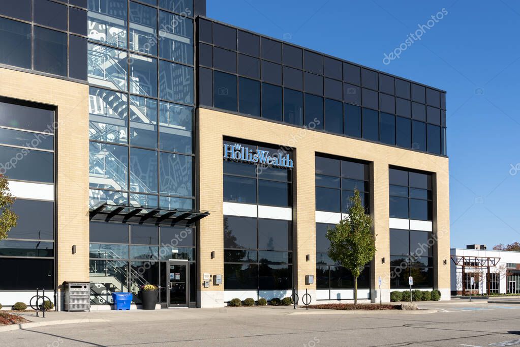Waterloo, Ontario, Canada - October 17, 2020: HollisWealth company sign on the Building in Waterloo, Ontario, Canada. HollisWealth is Canada's premier financial advisory networks.