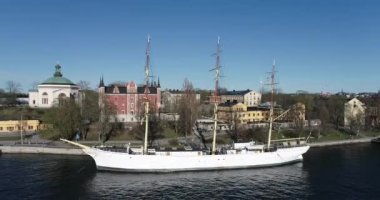 Af Chapman and Admiralty House. Full-rigged Steel Ship Moored on the Western Shore of the Islet Skeppsholmen in Central Stockholm, Sweden, Now Serving as a Youth Hostel