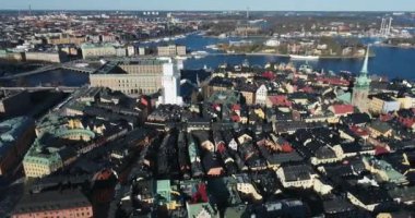 Stockholm Old Town and Royal Palace in Background. It is located in Gamla Stan Island in Stockholm, Sweden. Drone Point of View